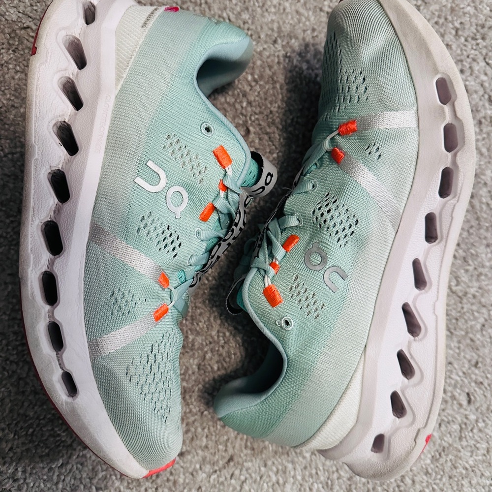 On Running Cloudstratus Shoes in Mint and Orange